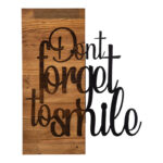 Wall deco Smiley pine wood in natural color and black metal 47x3x58cm